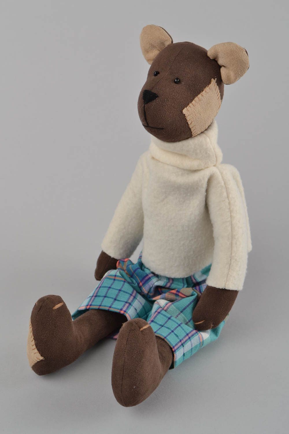 Handmade fabric soft toy brown bear in white sweater and checkered shorts photo 3