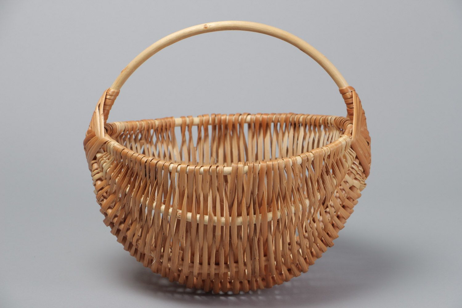 Small beautiful handmade Easter basket woven of willow withe of light color photo 2
