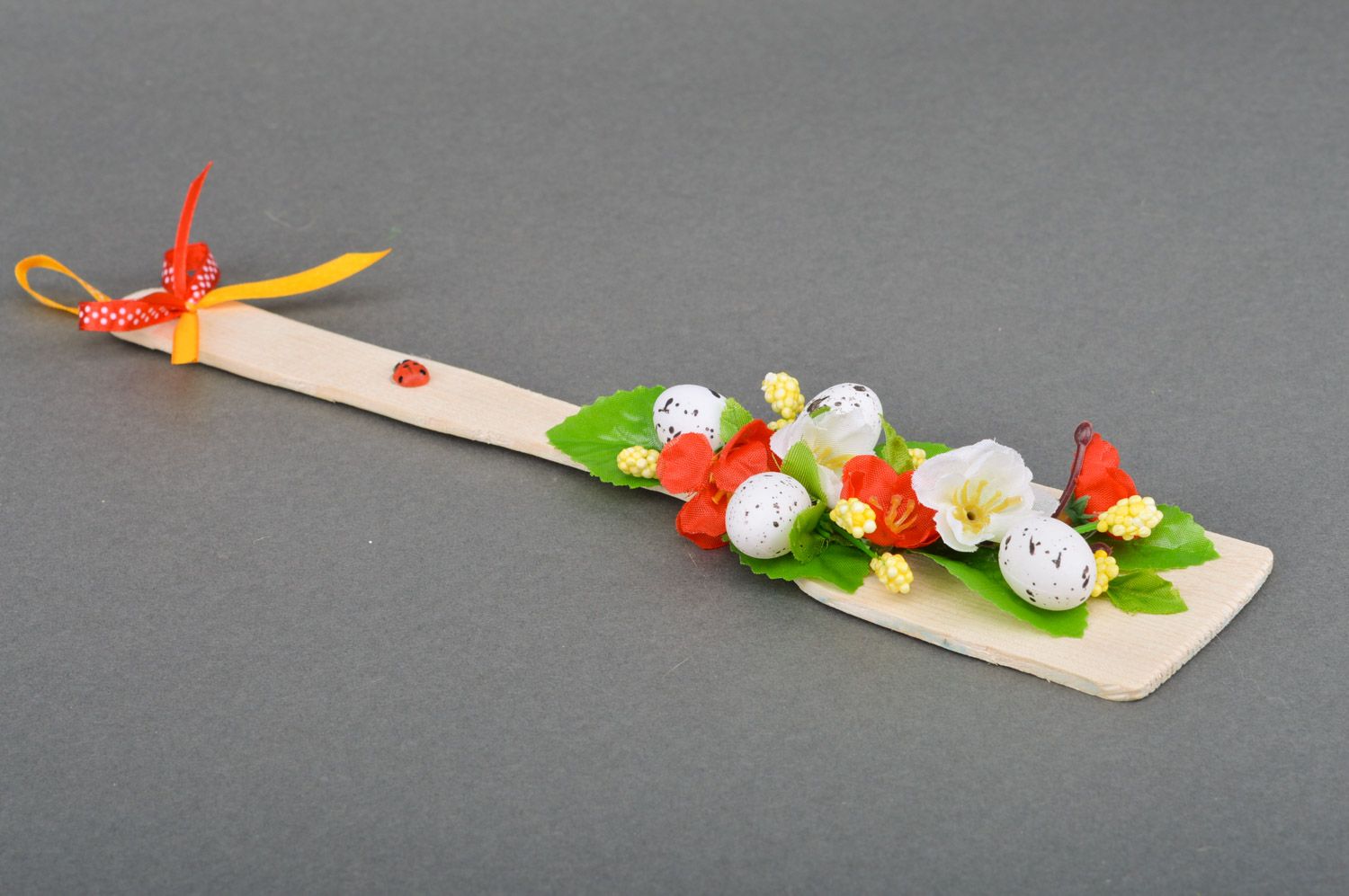 Handmade decorative wooden spatula with flowers and hollow eggs for wall decor photo 2
