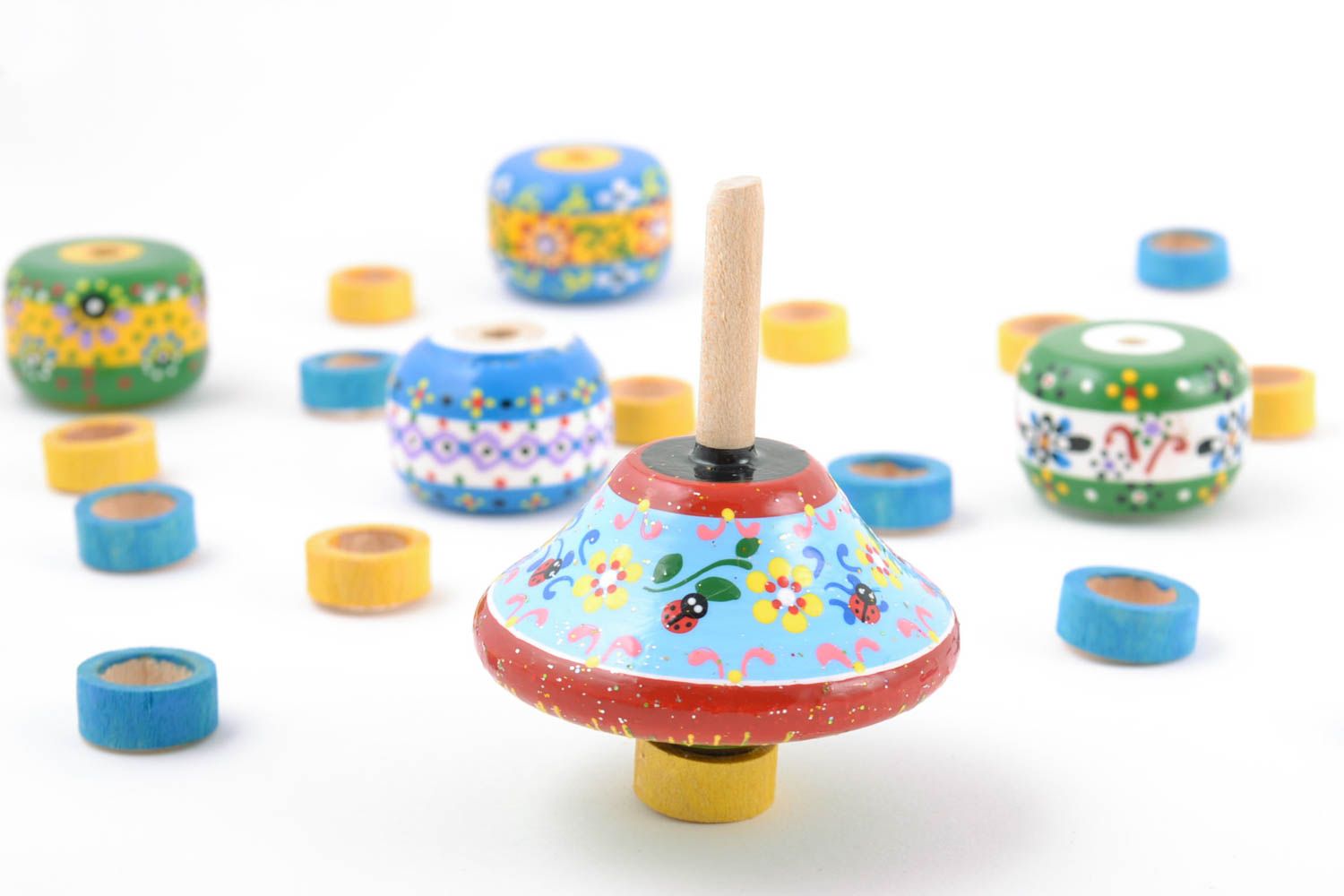 Beautiful children's handmade designer wooden spinning top toy with painting photo 1