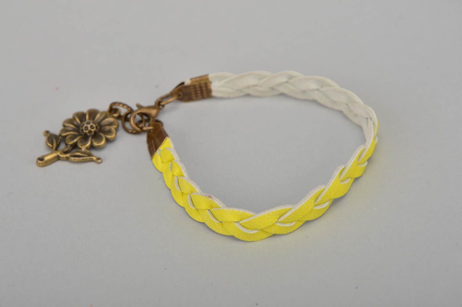 Handmade designer yellow genuine leather woven wrist bracelet with charm photo 4
