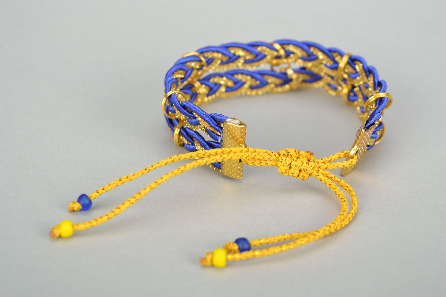 Blue and yellow friendship bracelet photo 3