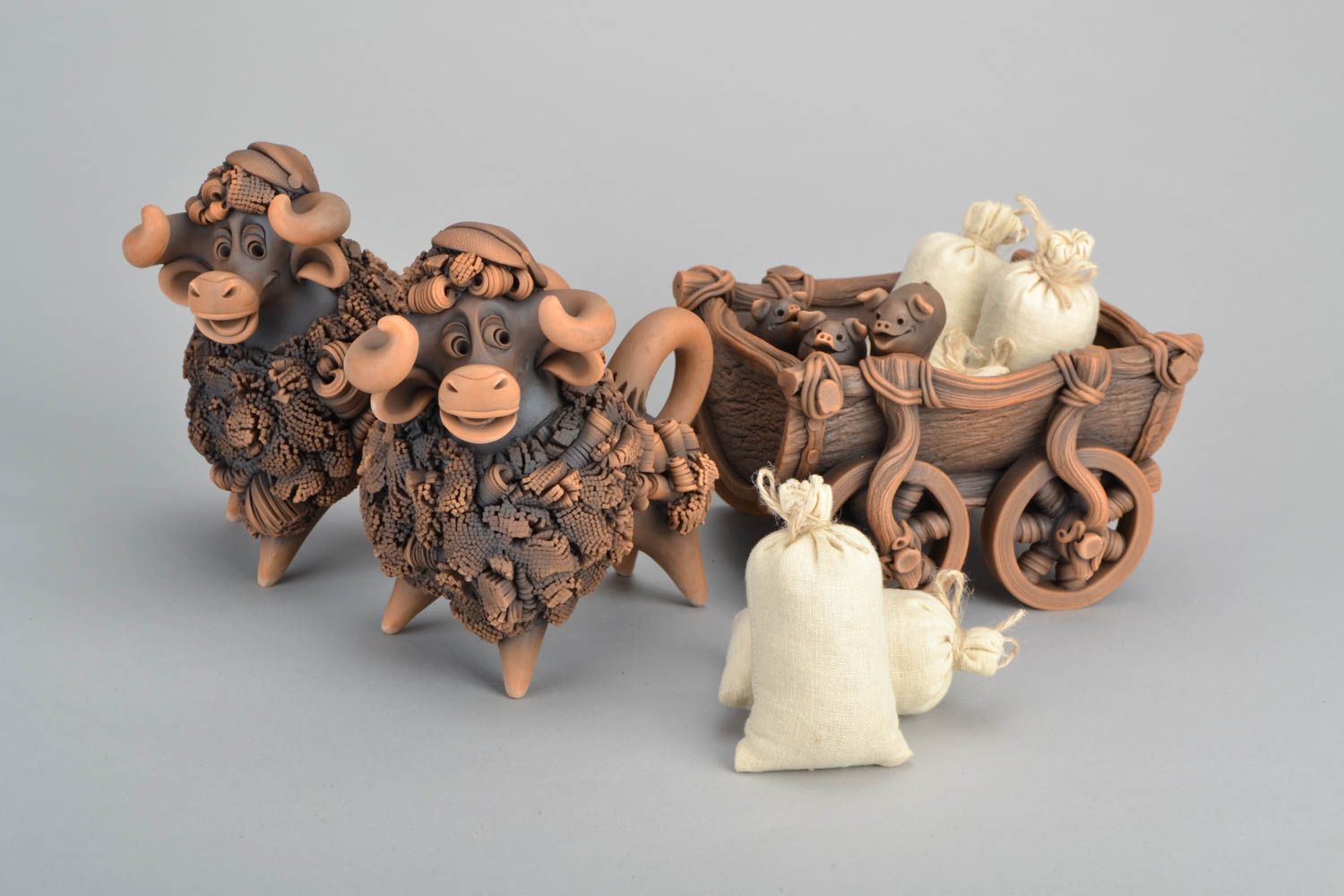 Designer ceramic figurine Bulls and Wagon photo 1