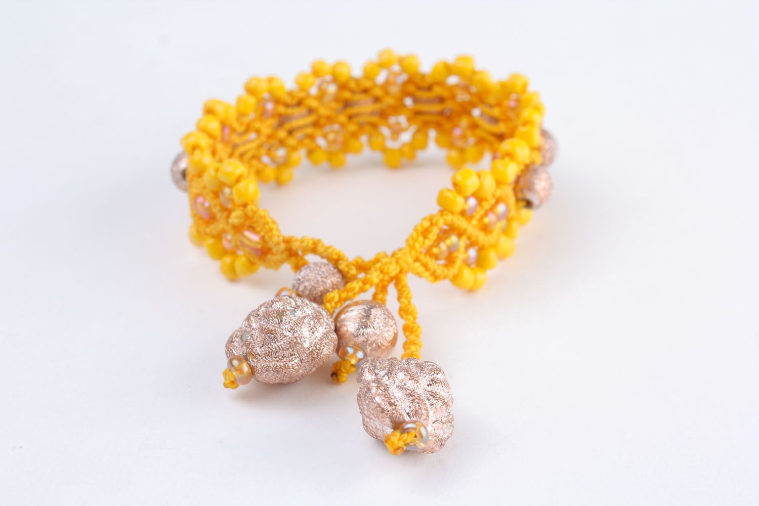 Bracelet tressé avec perles de rocailles femme photo 2