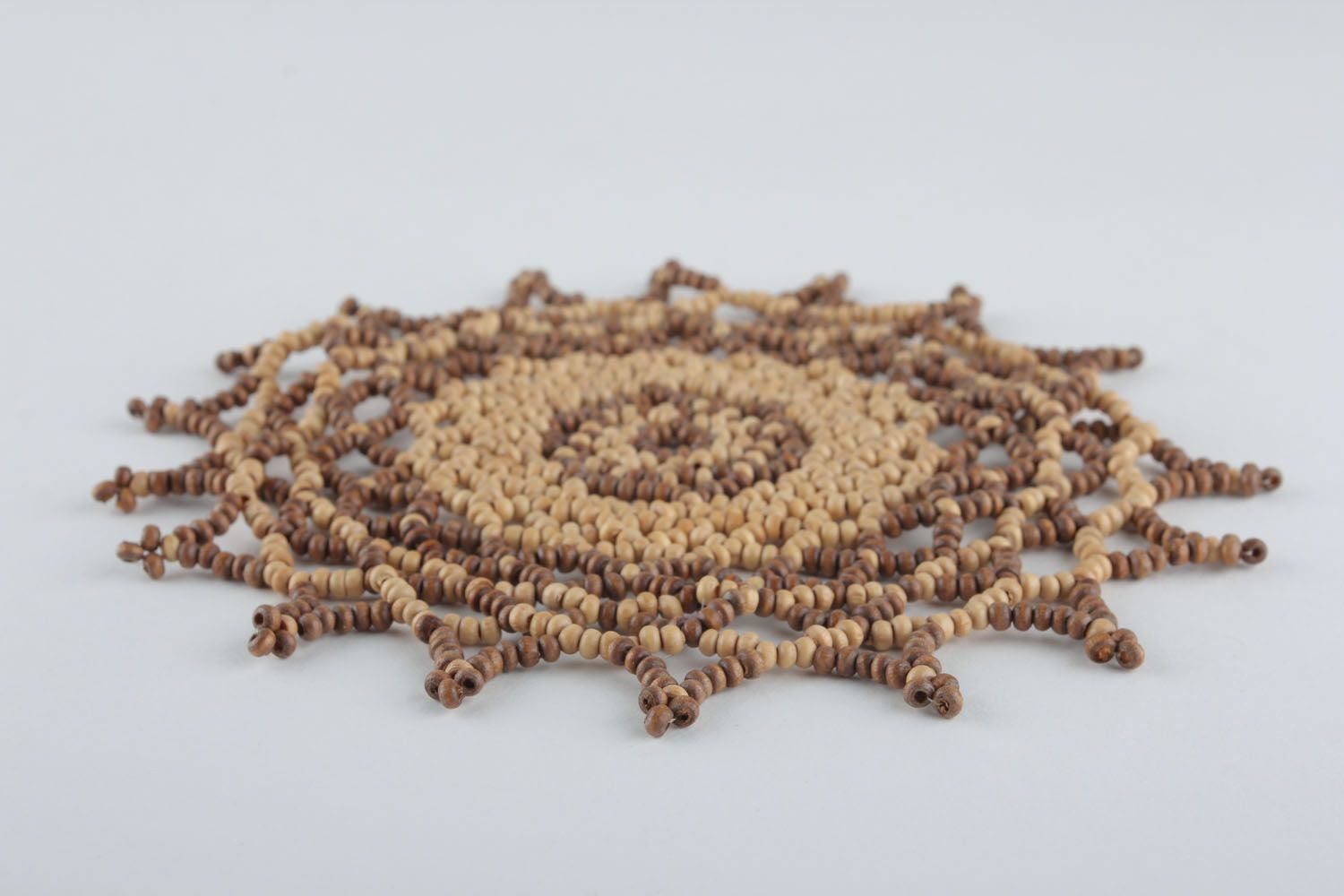 Napkin made of wooden beads photo 2
