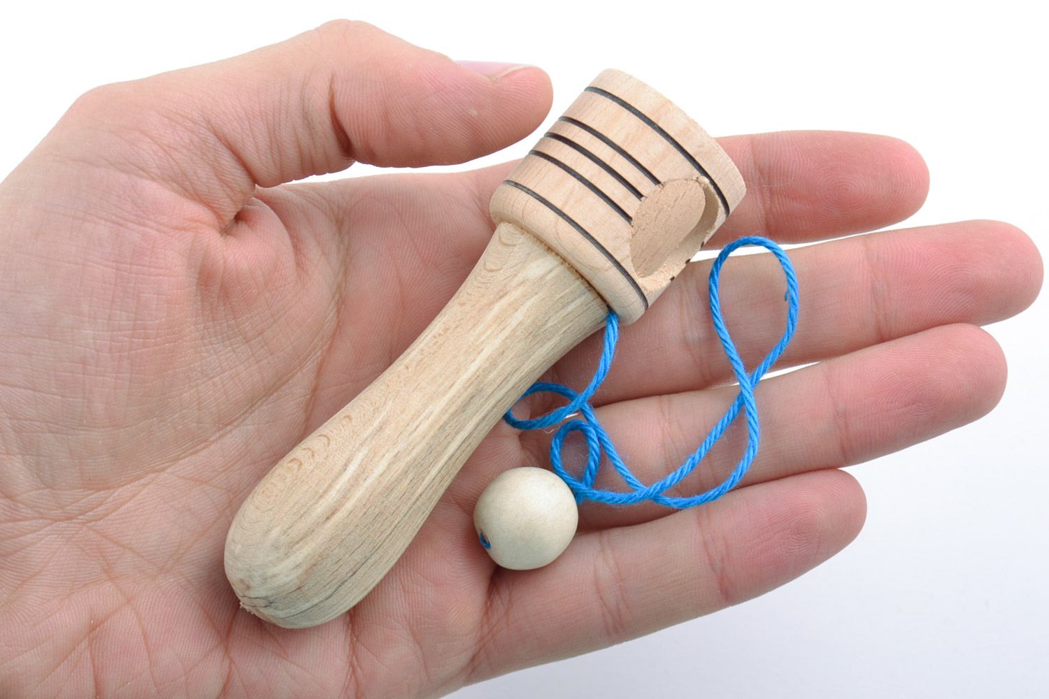 Handmade wooden cup and ball toy for coordination of movements for kids photo 2