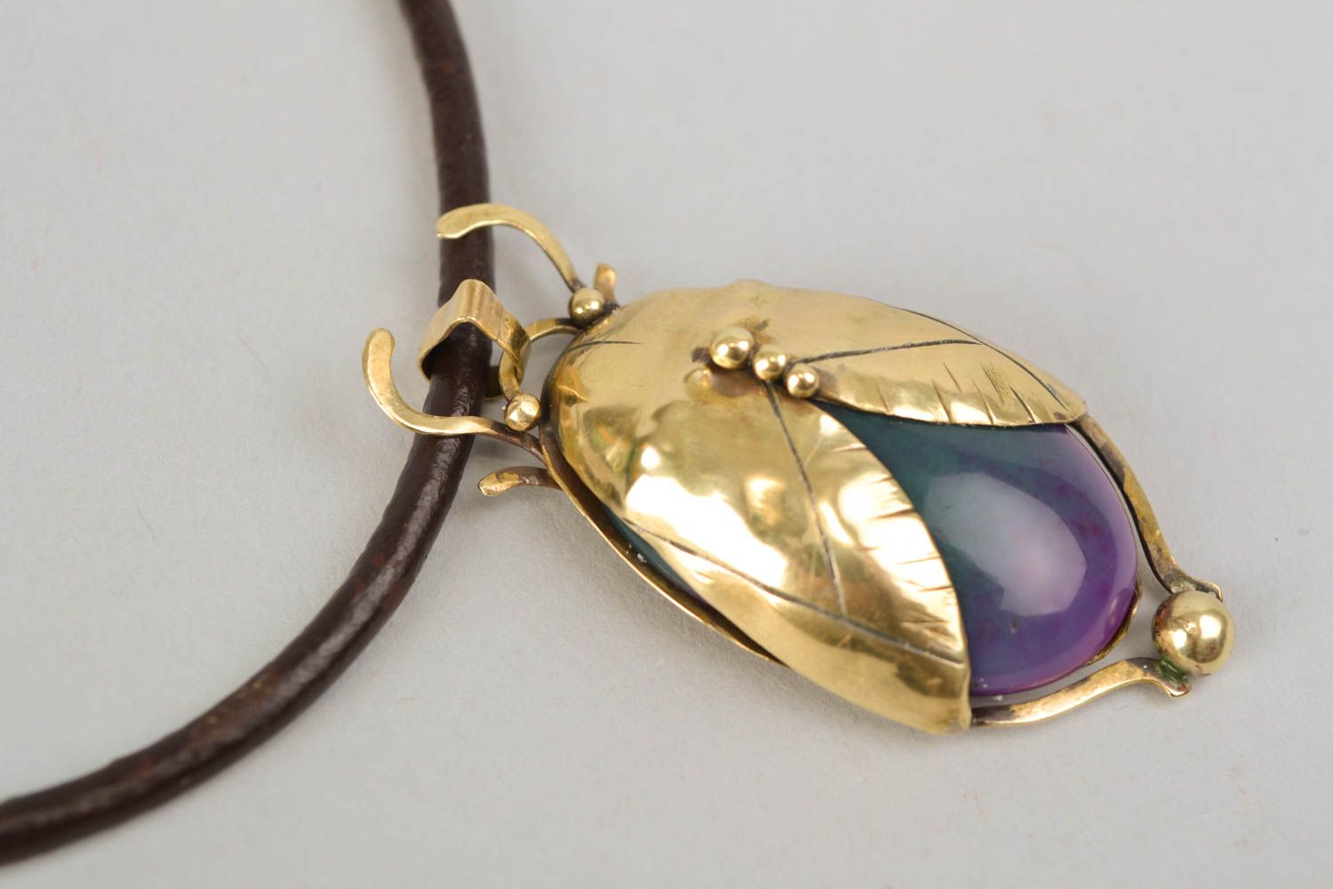 Latten pendant with agate and cord photo 3