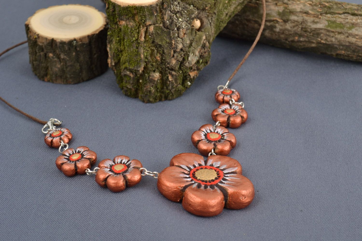 Handmade ceramic necklace on cord with molded flowers painted with acrylics photo 1