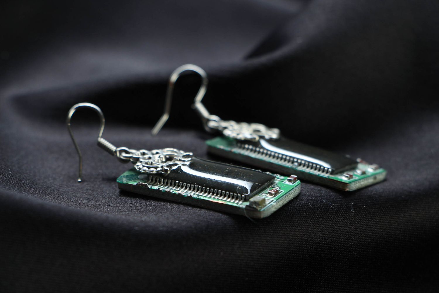 Designer metal earrings with microchips in cyberpunk style photo 2