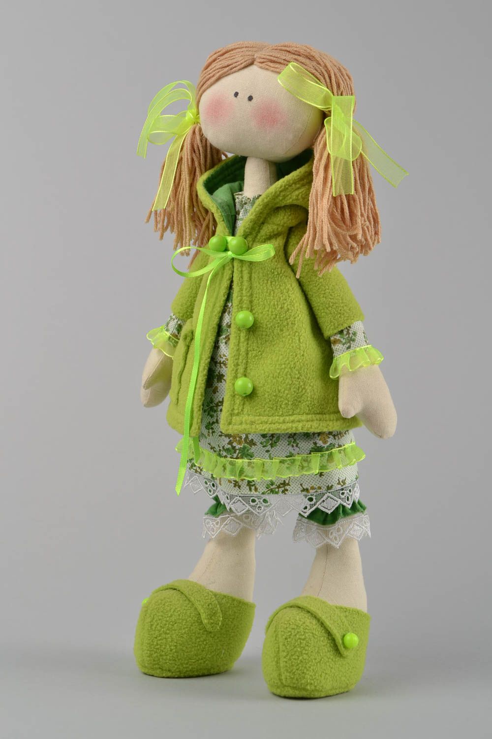 Handmade designer fabric soft doll girl in green clothing with pig tails photo 1