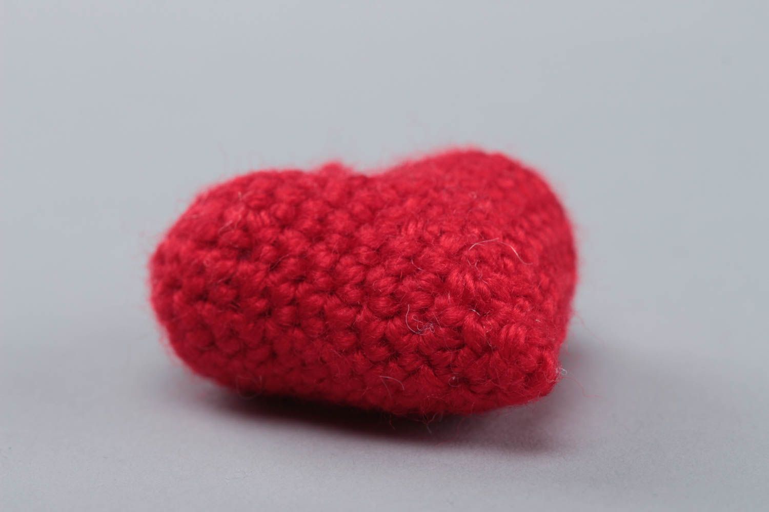Handmade small crochet soft toy red heart with eyelet for kids and interior decor photo 4