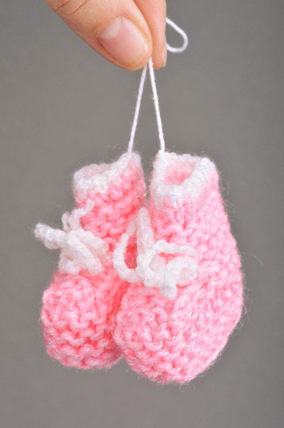 Handmade decorative wall hanging baby shoes knitted of semi-woolen pink threads photo 3