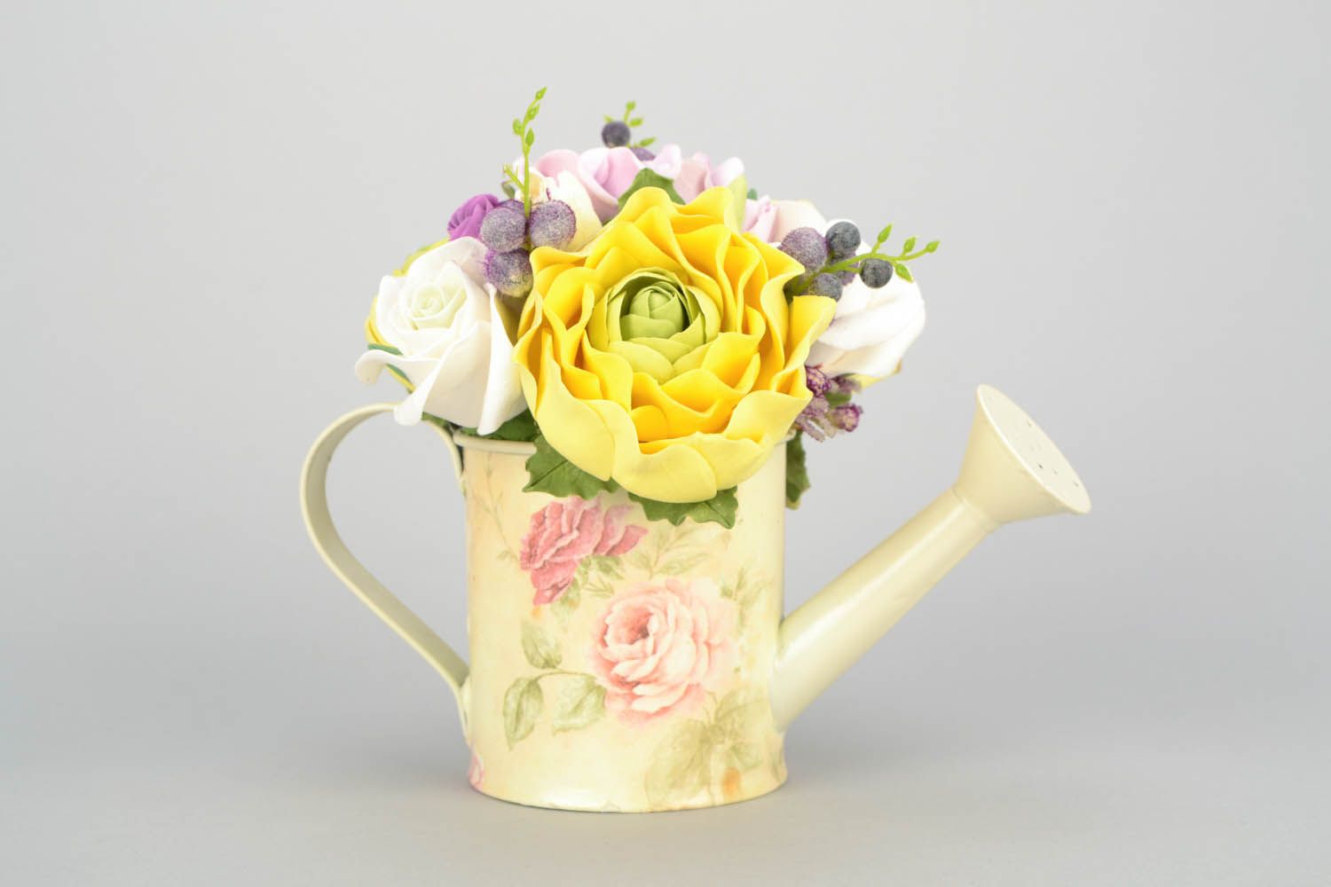 Watering can with flowers photo 3