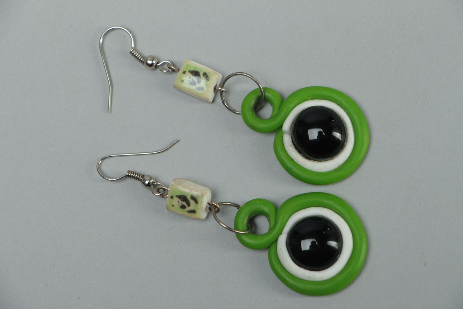 Round polymer clay dangle earrings of green color photo 1