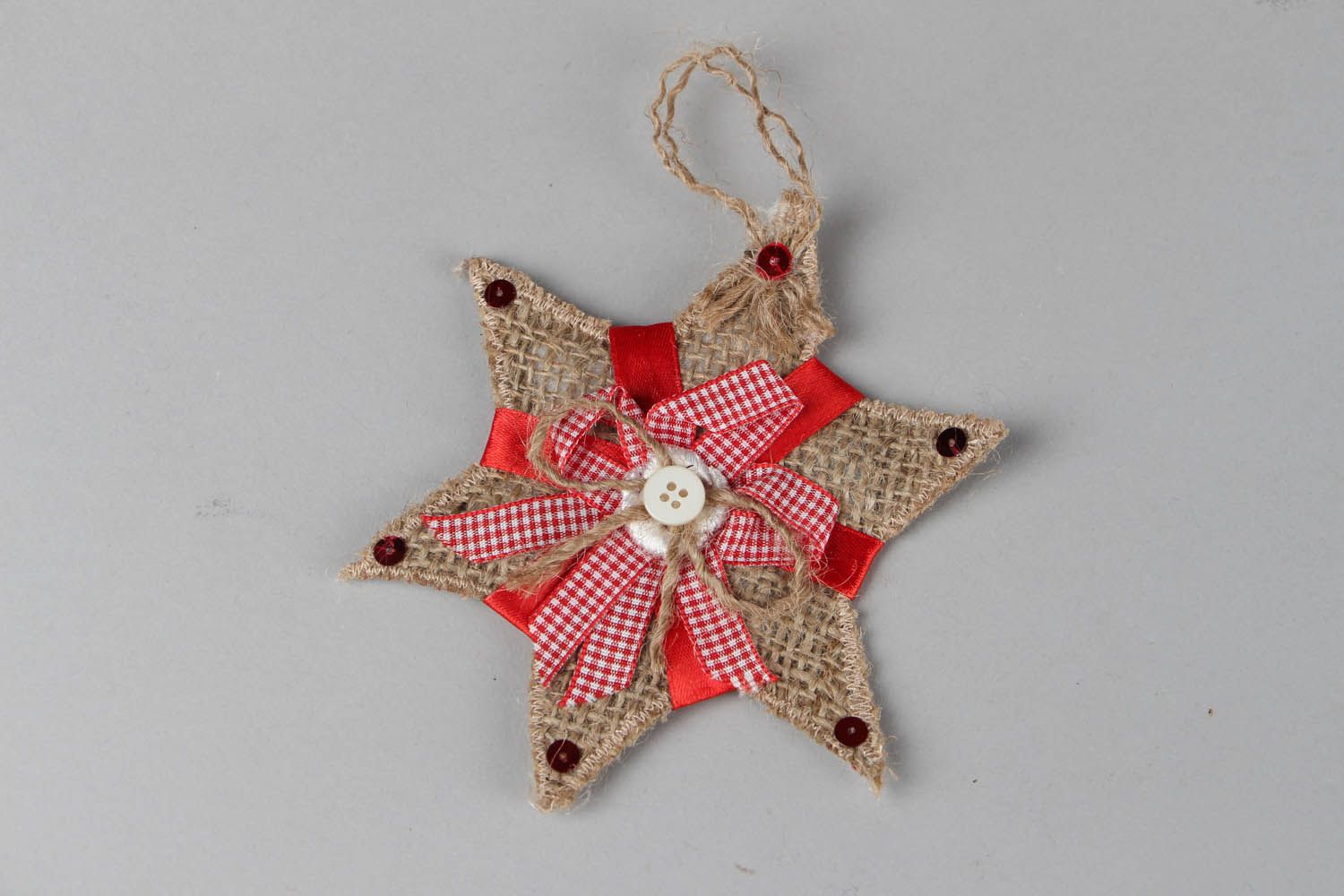 Brinquedo para Árvore de Natal feito à mão em forma de uma estrela  foto 1