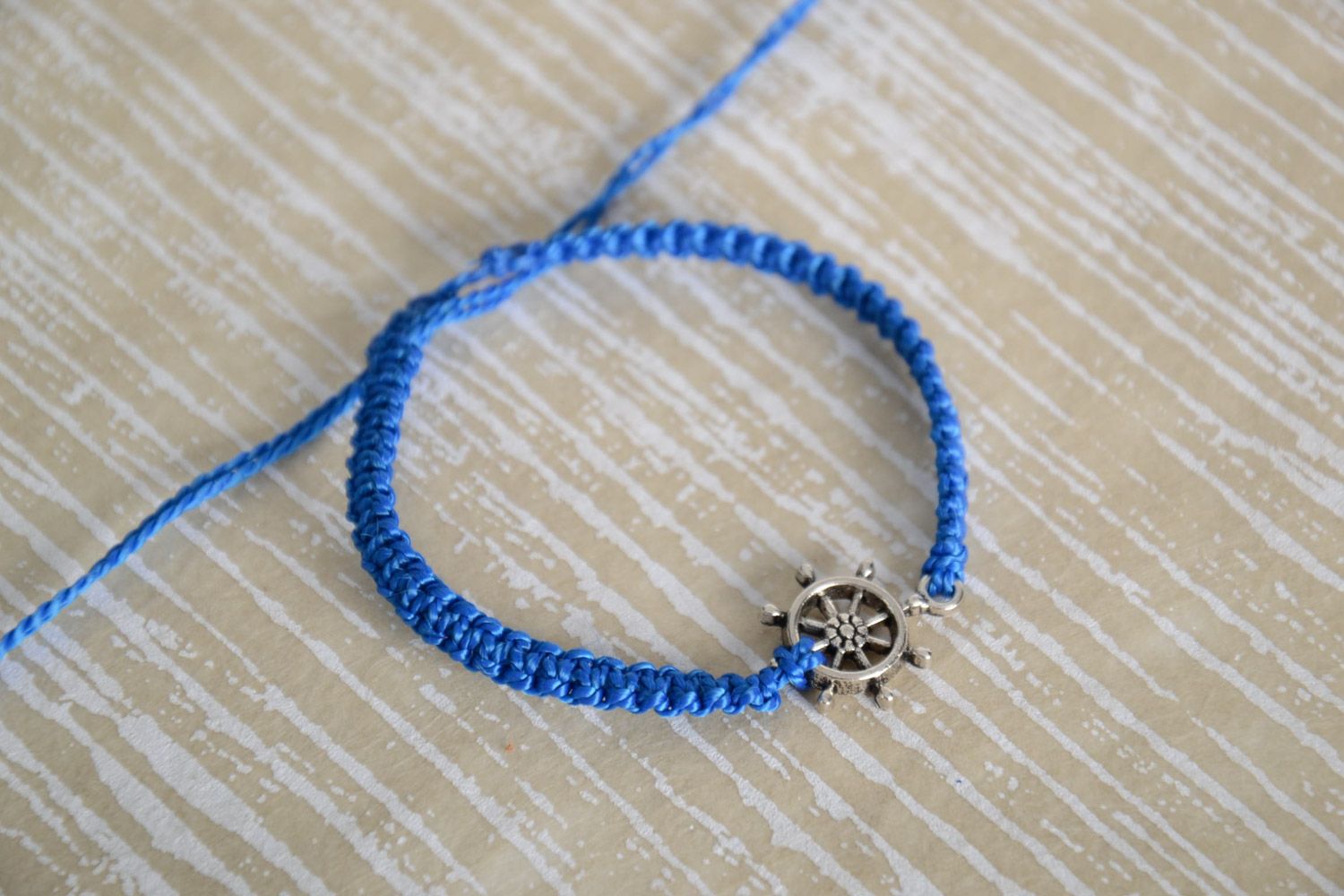 Handmade blue macrame woven thread bracelet with metal anchor charm photo 1