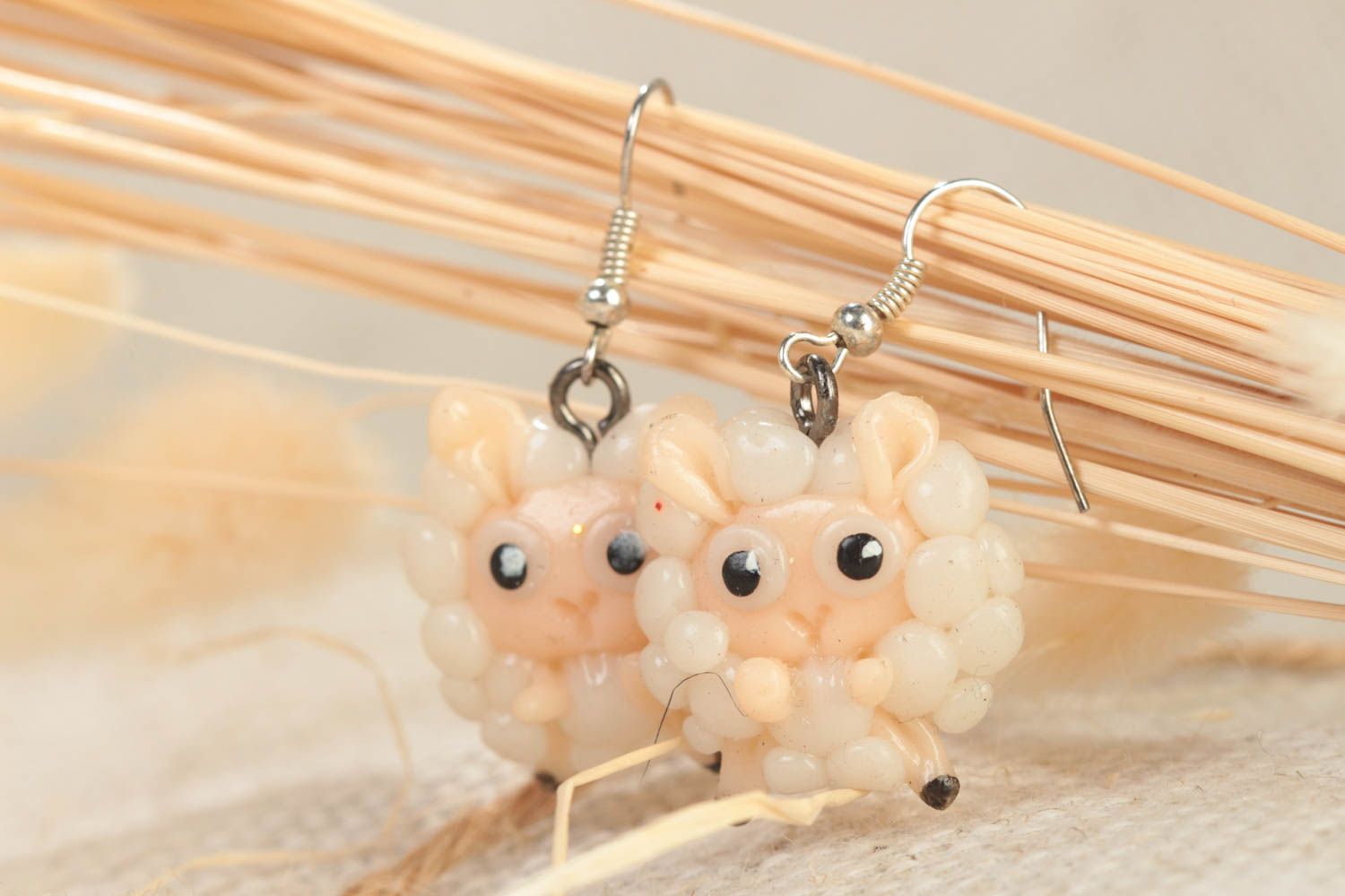 Handmade polymer clay dangling earrings in the shape of funny cute lambs photo 1