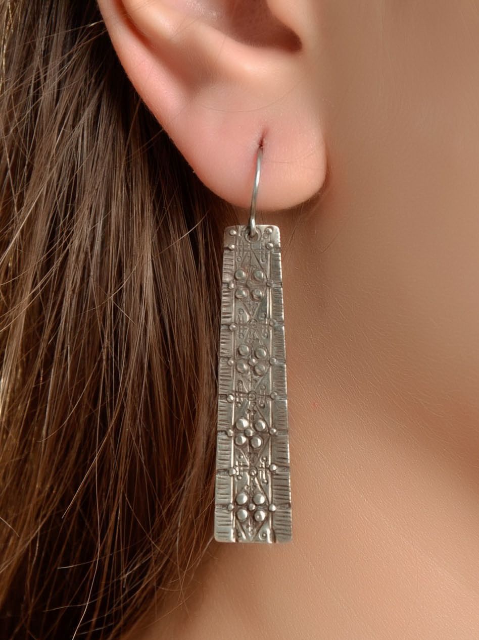 Boucles d'oreilles faites main en métal photo 4