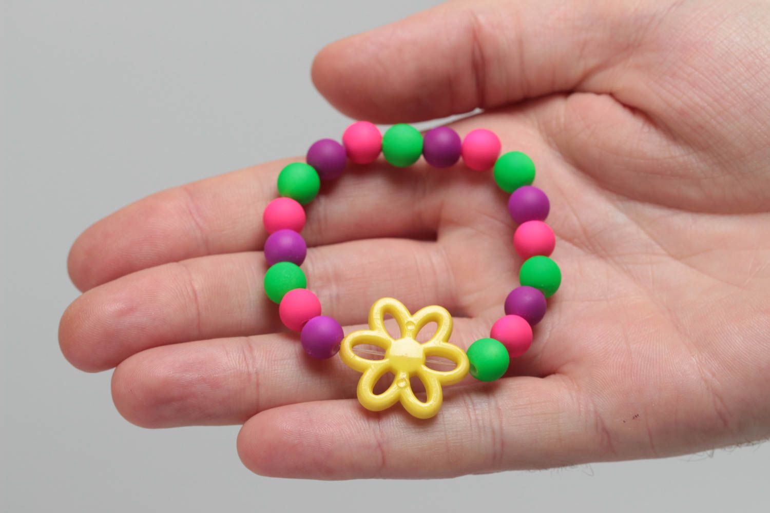 Unusual bright handmade children's plastic ball bracelet with flower photo 5
