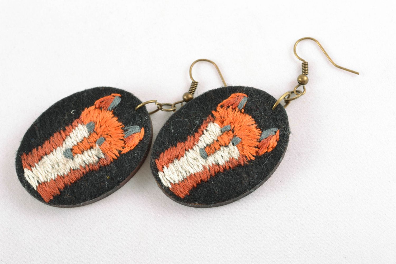 Beautiful unusual earrings with embroidery photo 3