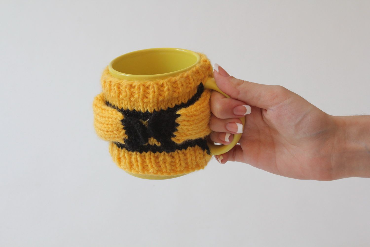 Cup in yellow color with handle and knitted bee colors' cover photo 3