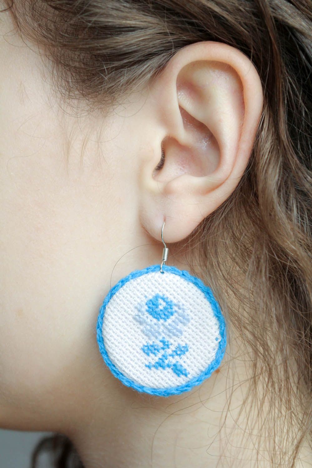 Embroidered earrings in blue colors photo 1