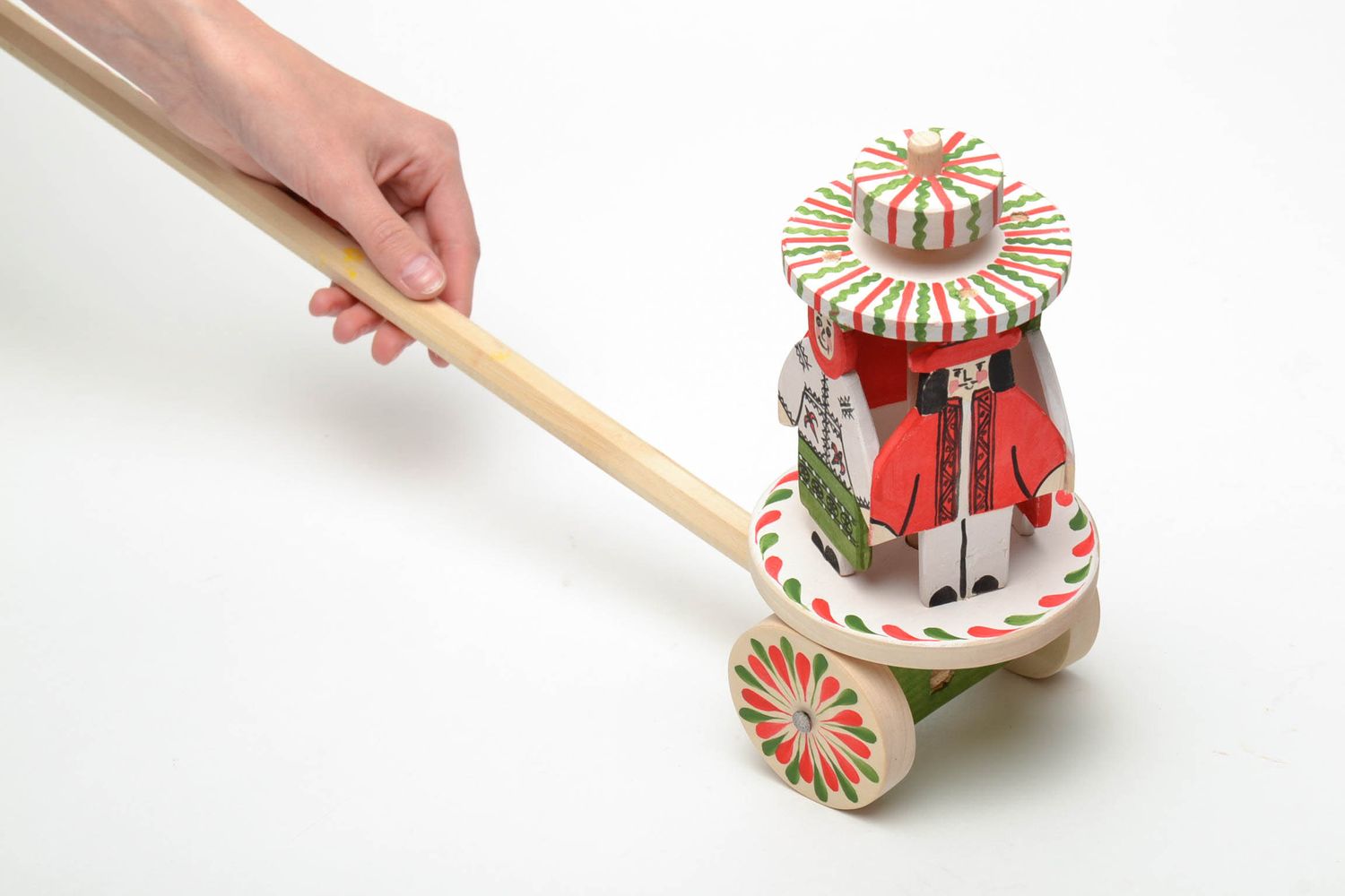 Wooden wheeled toy with Ukrainian ethnic painting The Hutsuls photo 5