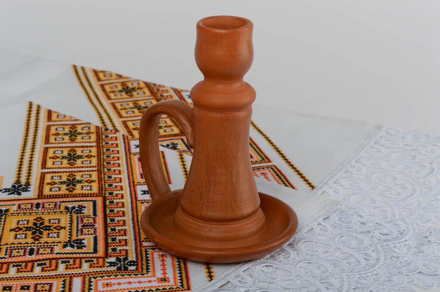 Brauner keramischer Kerzenhalter aus Ton für eine Kerze handmade für Interieur foto 1