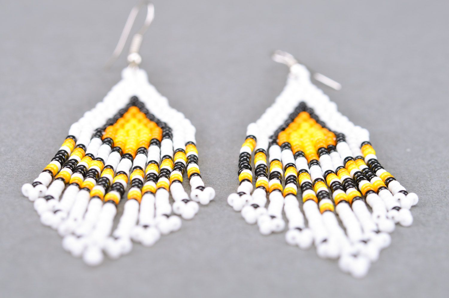 Unusual stylish light handmade earrings woven of Czech beads with fringe photo 5