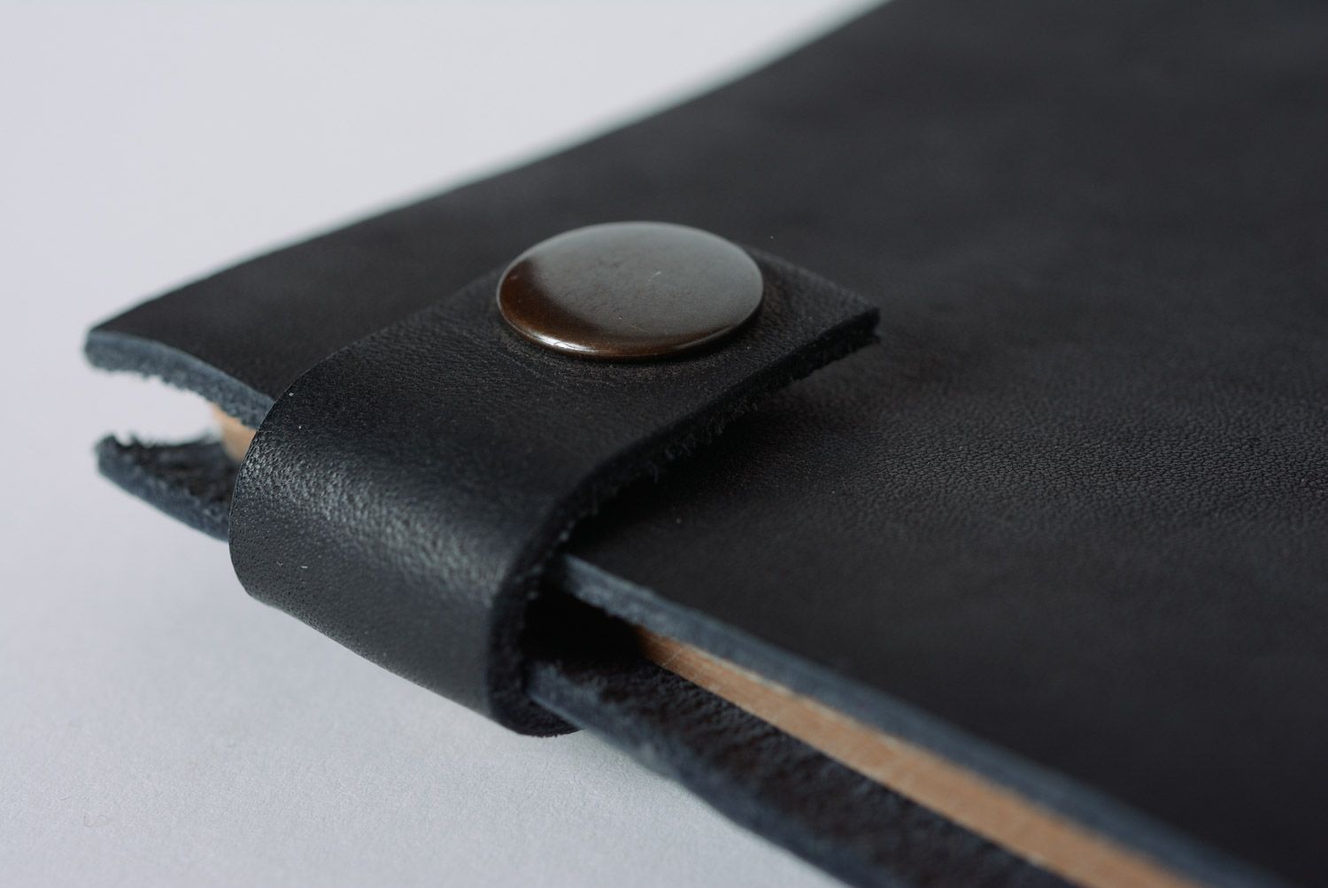 Unusual black handmade notebook with leather cover and kraft paper photo 2
