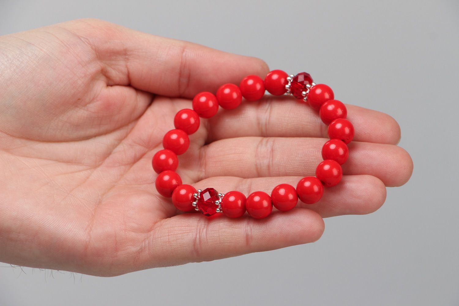 Handmade wrist bracelet with bright red plastic and glass beads for women photo 3