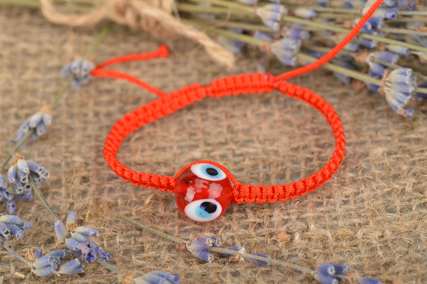 Bracelet tressé rouge en lacet ciré fait main avec perle-œil bijou mode photo 1