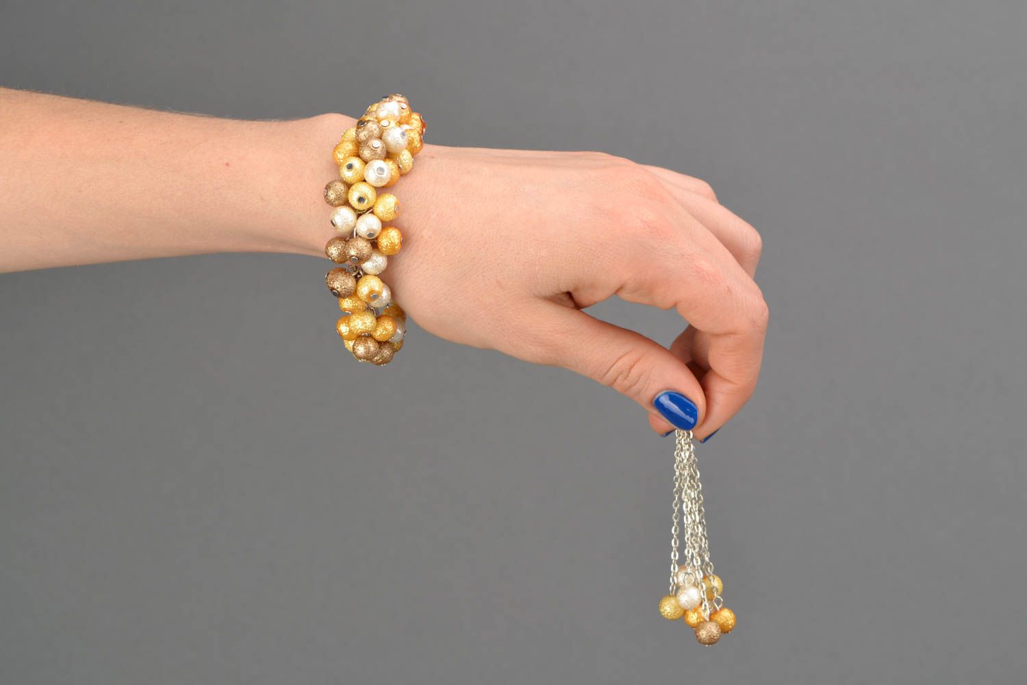 Boucles d'oreilles et bracelet artisanaux de perles fantaisie photo 2