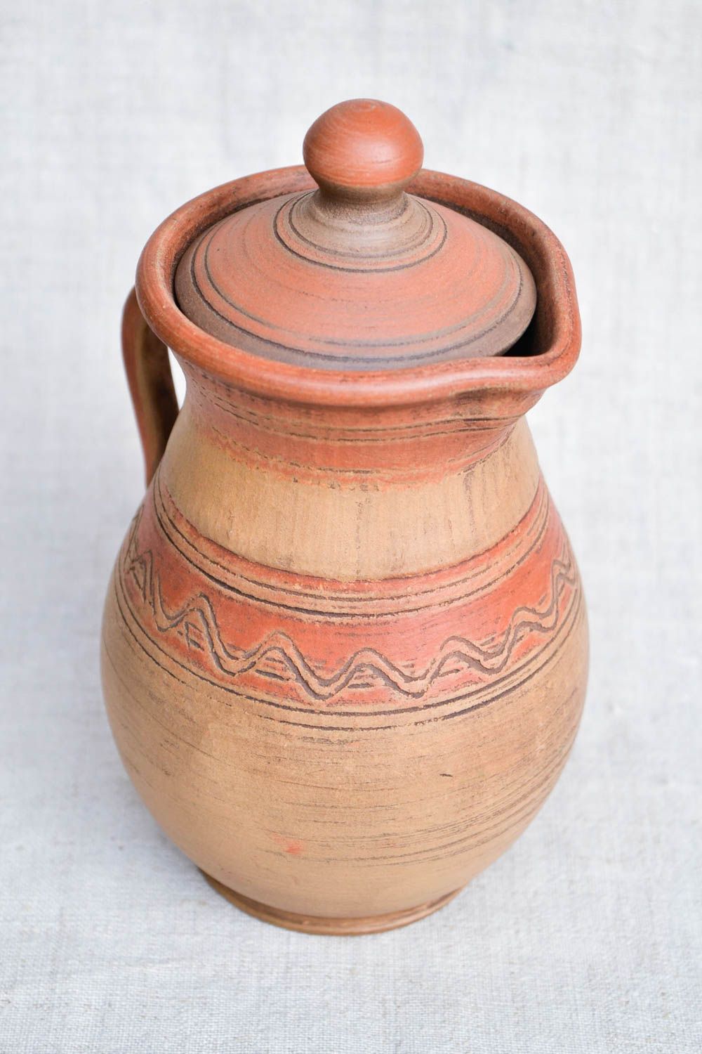 Jarro de cerámica hecho a mano recipiente de barro utensilio de cocina foto 4