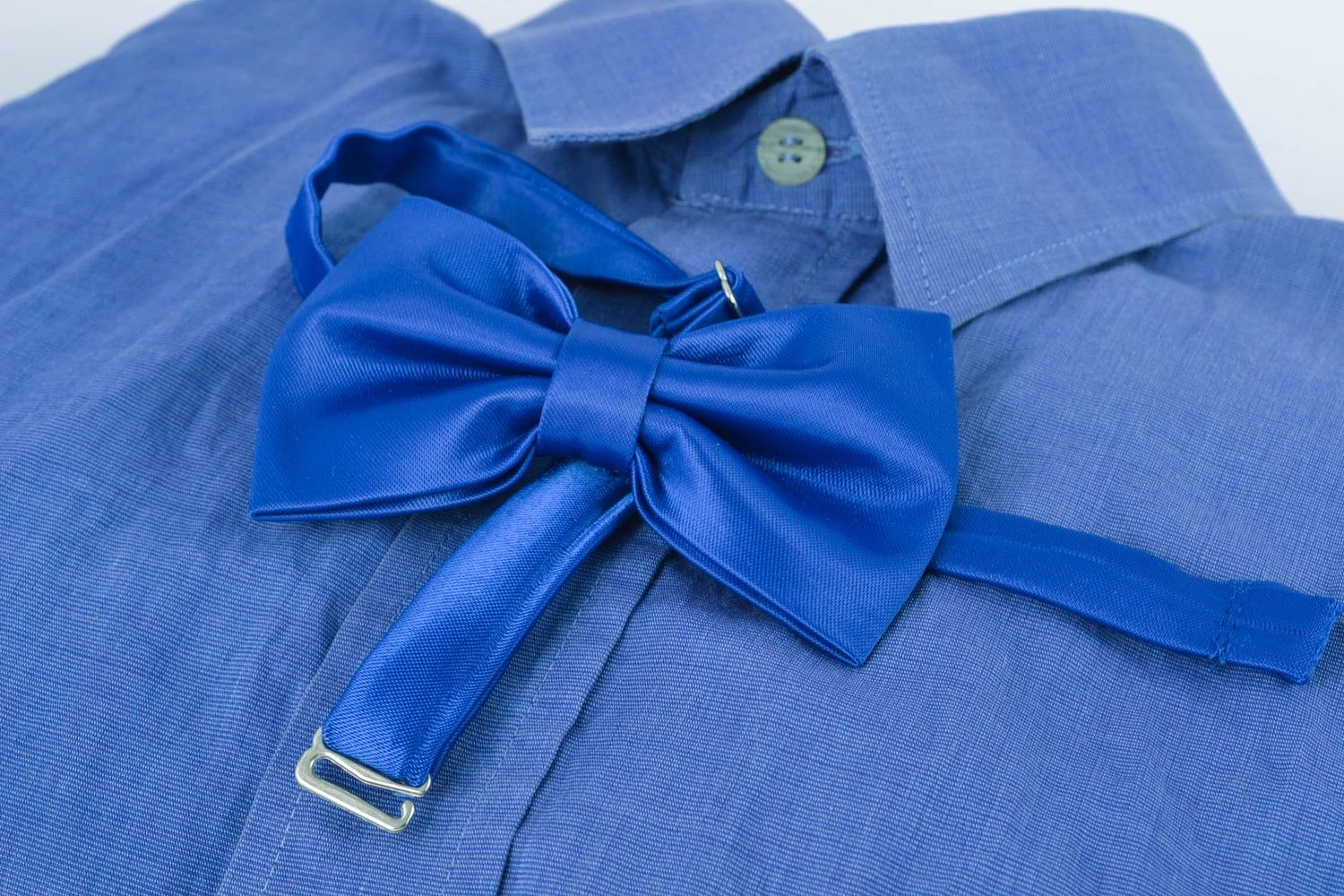 Fabric bow tie of shimmering blue color  photo 1