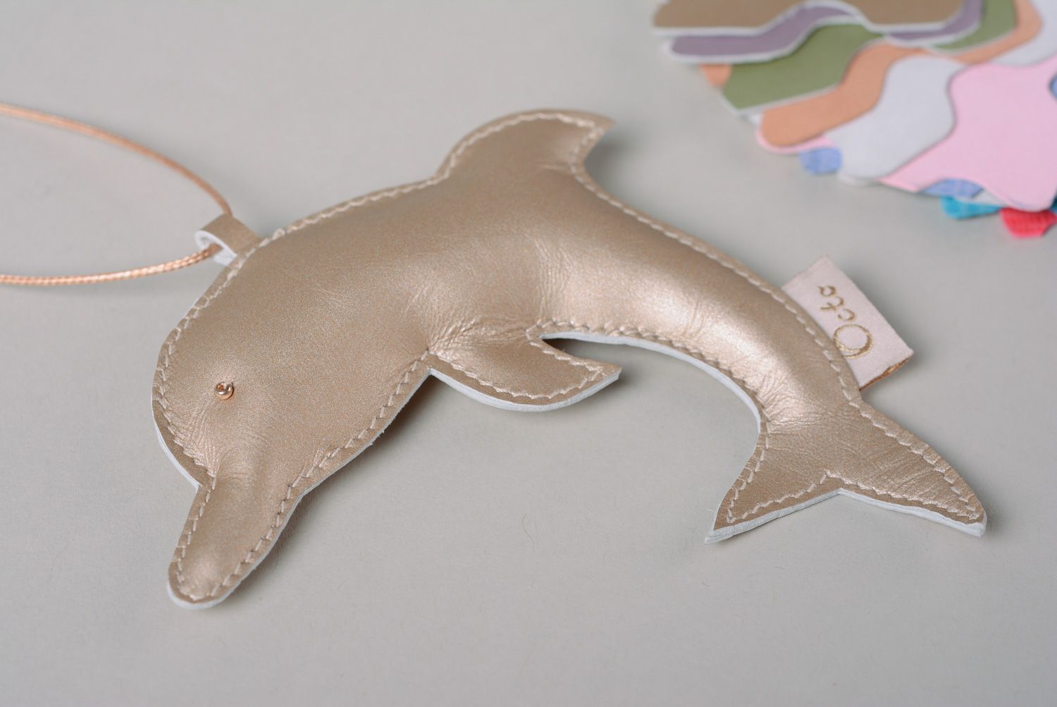 Soft homemade leather keychain bag charm in the shape of dolphin of light color photo 5