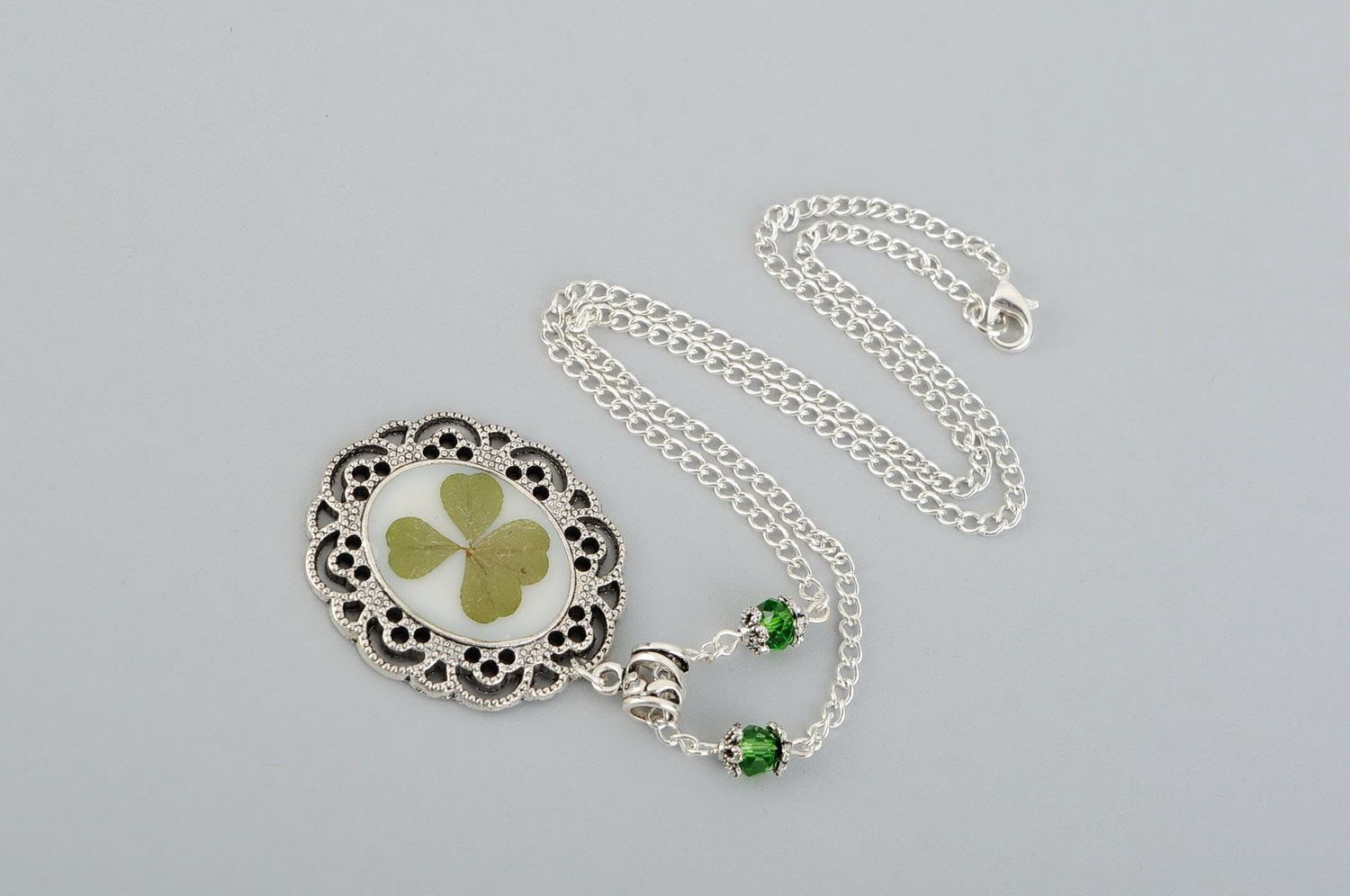 Pendant with a natural four-leaf clover photo 3