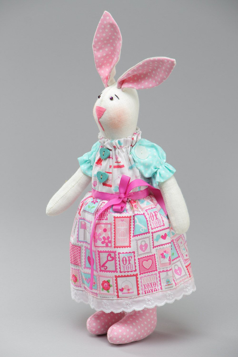 Cute handmade soft toy sewn of natural fabrics Rabbit with pink ears and dress photo 2
