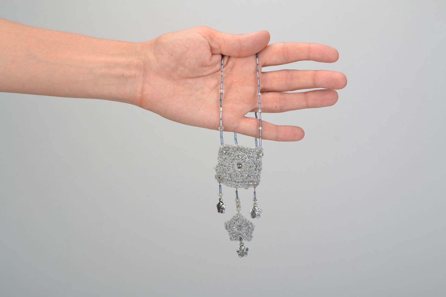 Crocheted pendant Shades of grey color photo 2