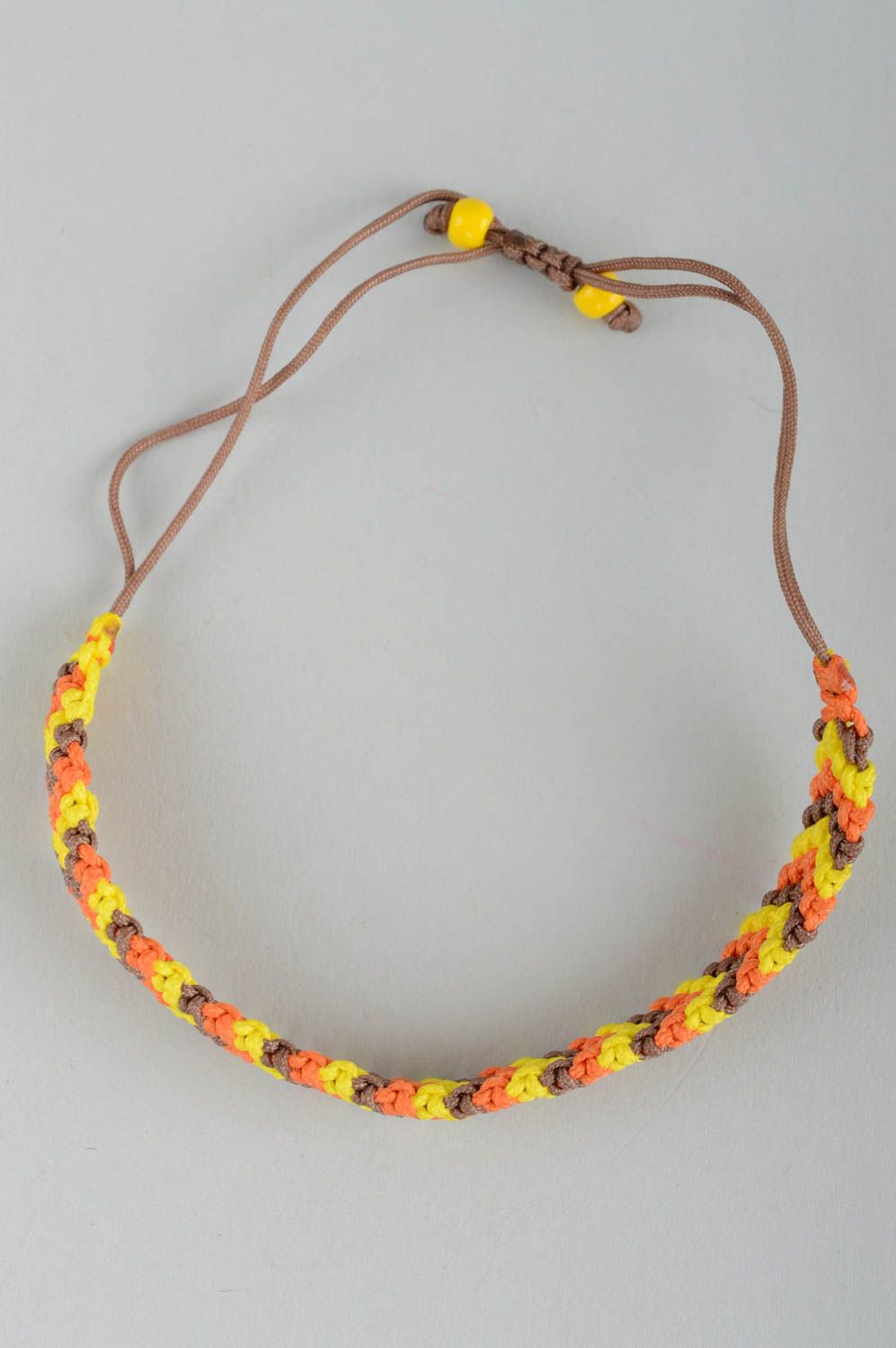 Bracelet textile Bijou fait main jaune orange marron Accessoire femme tressé photo 2