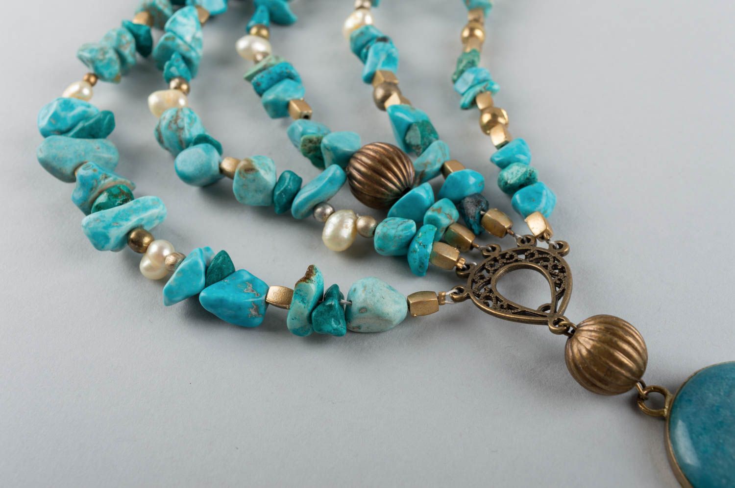 Handmade beautiful turquoise long necklace made of natural stones and metal photo 5