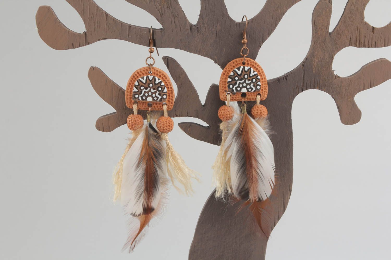 Long earrings with feathers photo 1