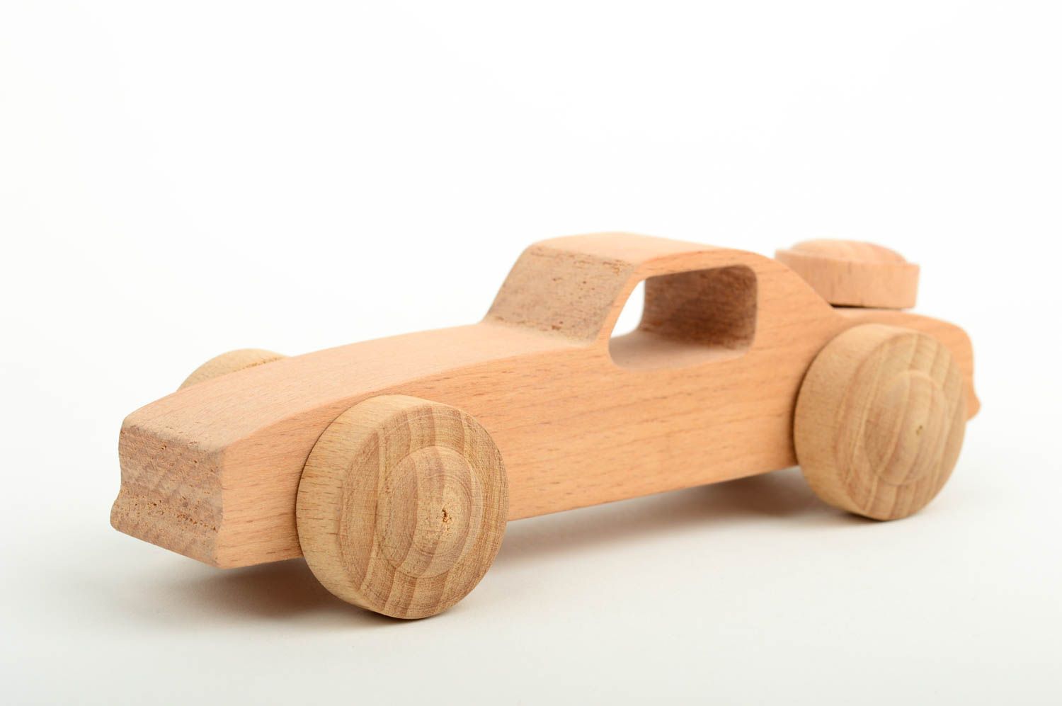 Auto aus Holz handmade Fahrzeug aus Holz ökologisch Holzspielzeug für Kinder foto 3