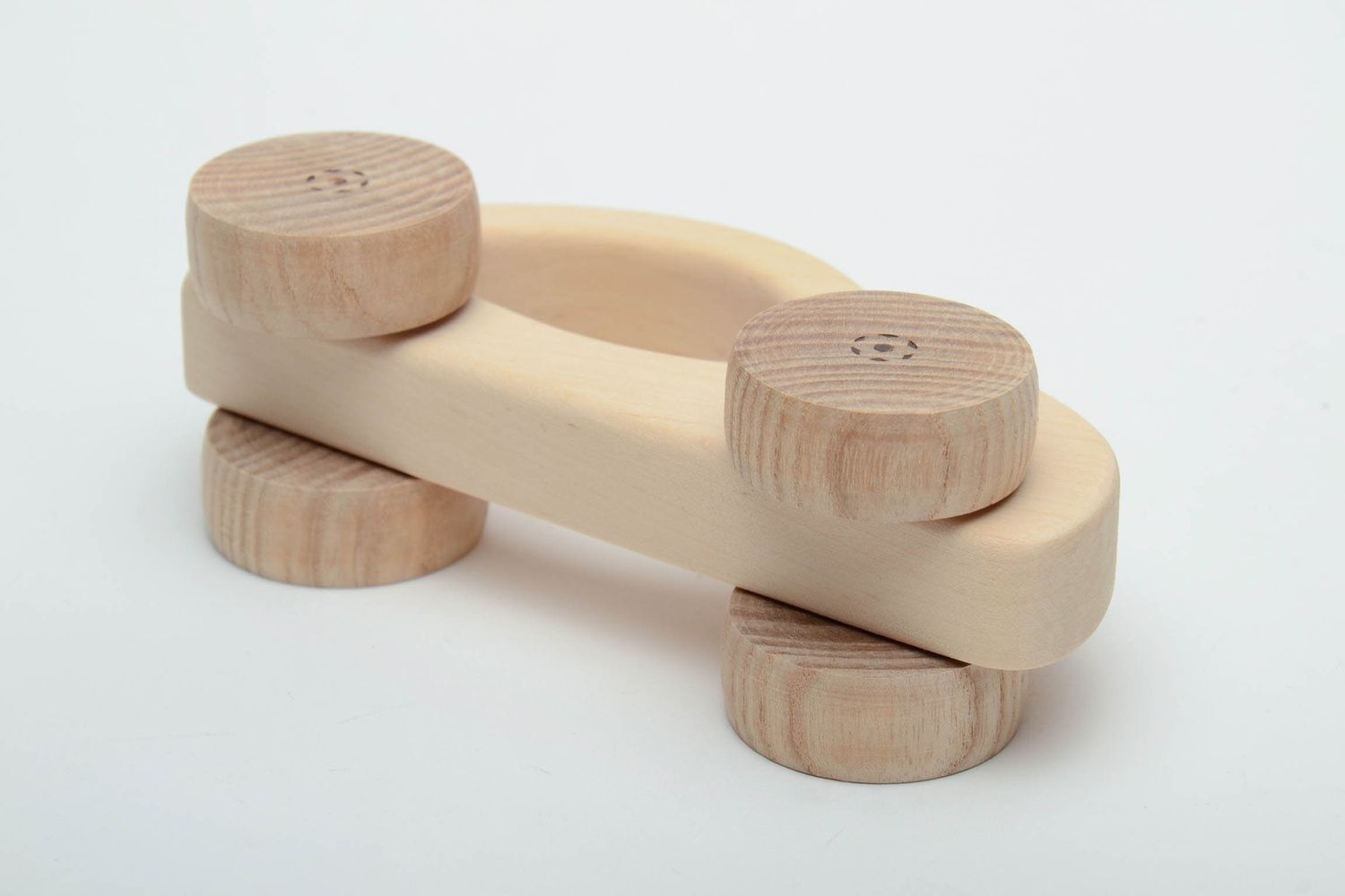 Wooden wheeled toy car photo 4