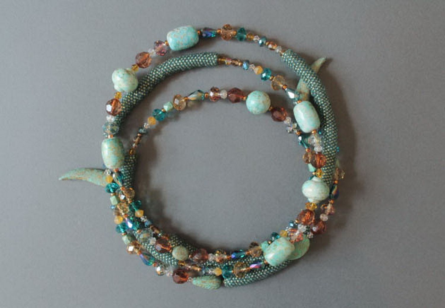 Plaited necklace made from beads with decorative stones photo 7