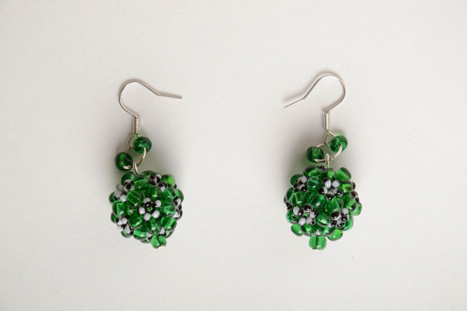 Handmade beautiful ball-shaped dangling earrings crocheted of green beads photo 5
