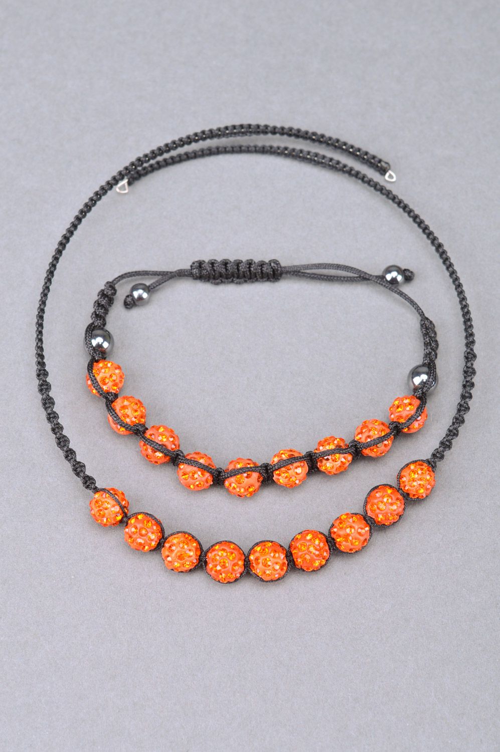 Set of jewelry woven of threads and orange beads necklace and friendship bracelet photo 2
