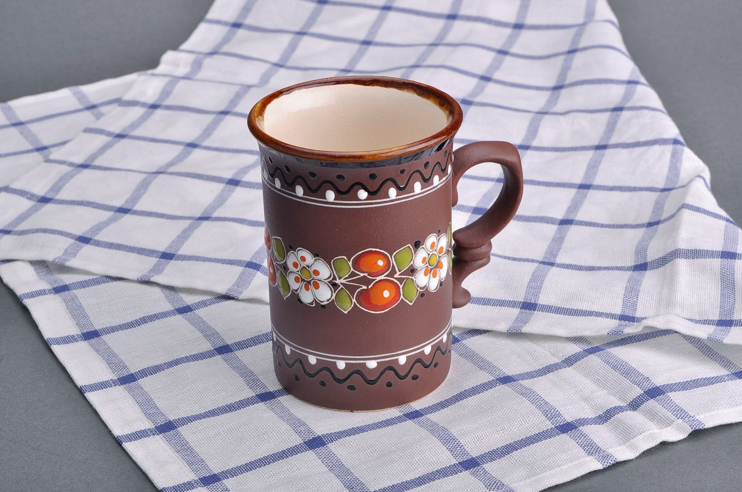 Tall decorative 8 oz glazed cup in brown color with floral design and handle photo 4