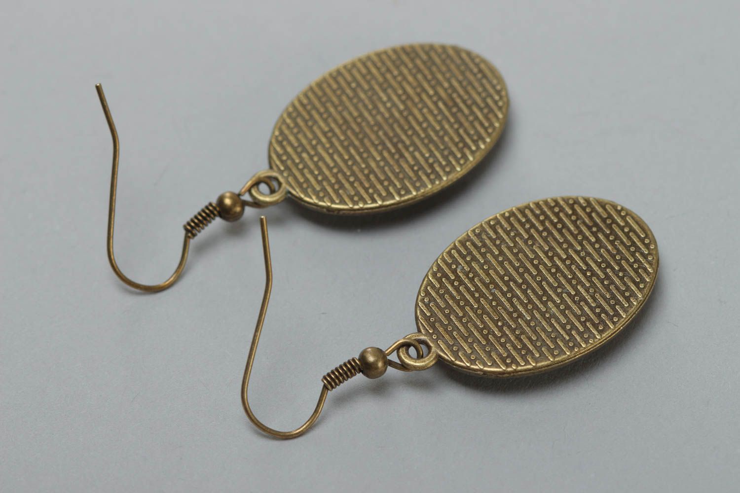 Handmade designer oval dangling earrings with metal basis and glass like glaze photo 4