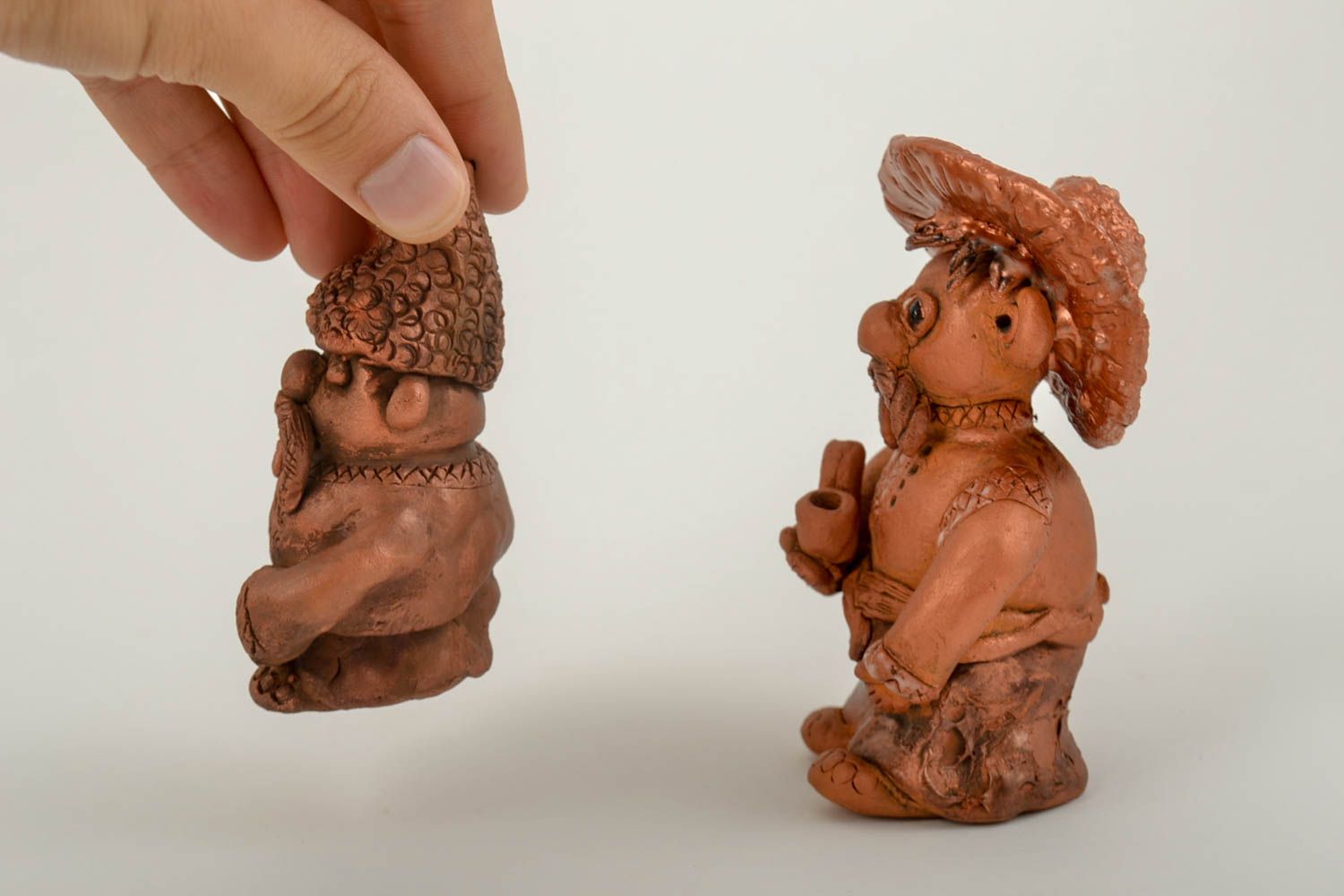Statuette divertenti in argilla fatte a mano figurine decorative in ceramica 
 foto 3